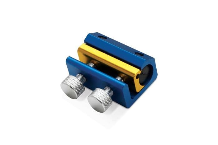 Blue and gold cable luber tool with two silver adjustment screws and a black cable seal