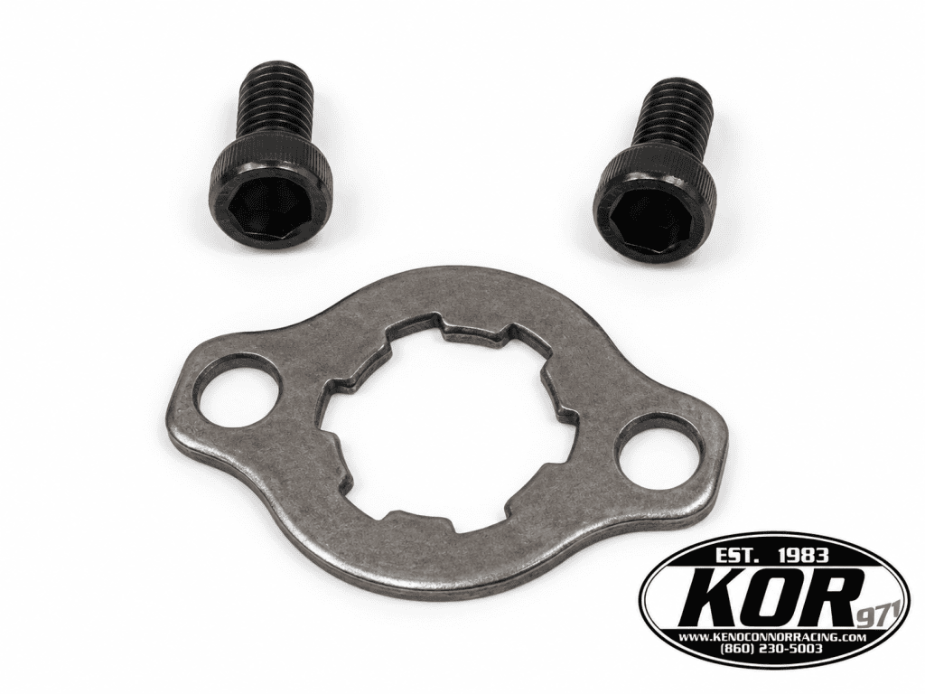 OEM Yamaha Blaster front sprocket retaining plate and two OEM socket head bolts on a white background with KOR logo