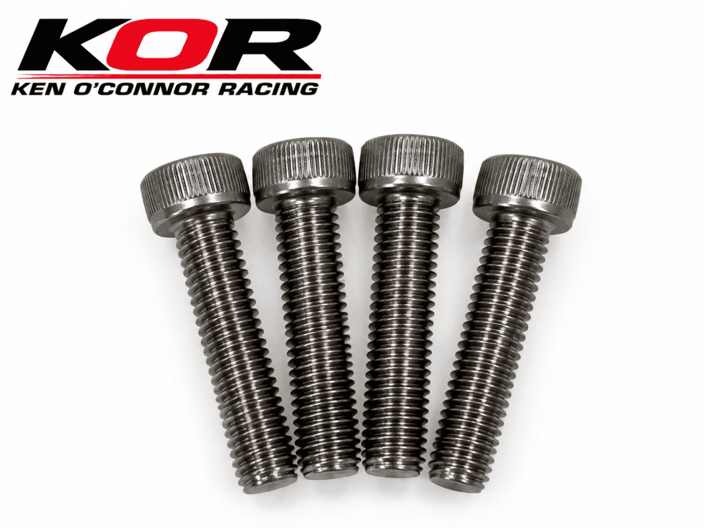 Four Yamaha Blaster oil pump cover bolts arranged on a white background beneath the black-and-red KOR logo