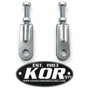 Two Yamaha Blaster chain adjusters with threaded bolts and nuts on a white background above the black and white KOR logo.