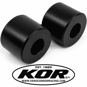 Two black Yamaha Blaster chain rollers with center mounting holes on a white background above the KOR logo.