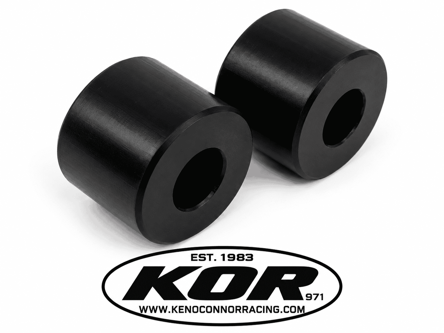 Two black Yamaha Blaster chain rollers with center mounting holes on a white background above the KOR logo.