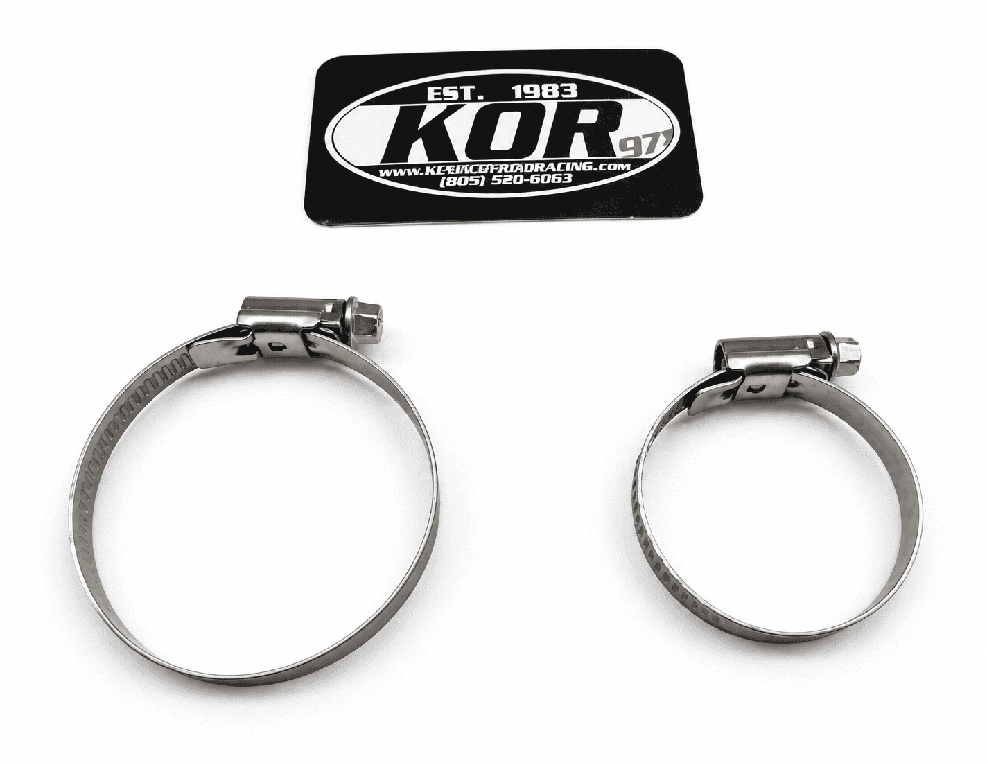 Two adjustable Yamaha Blaster 28mm PWK carburetor clamps on a white background below a KOR identification card.