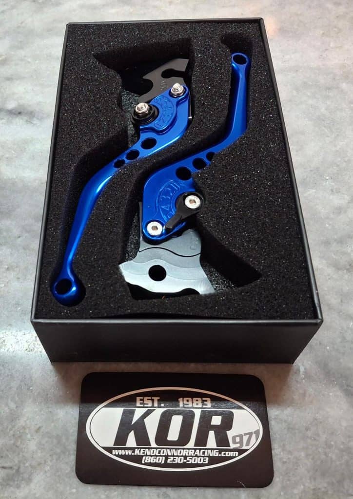 High-quality blue motorcycle brake and clutch levers for racing, designed for optimal control and du.