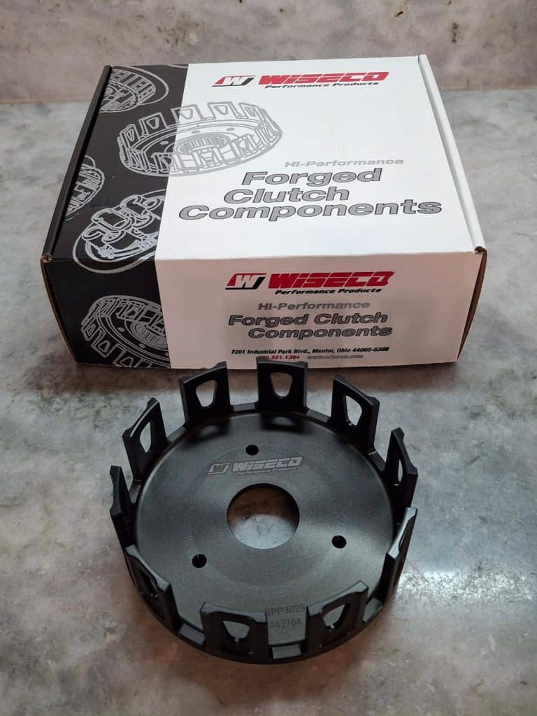WISECO forged clutch component for high-performance racing vehicles.